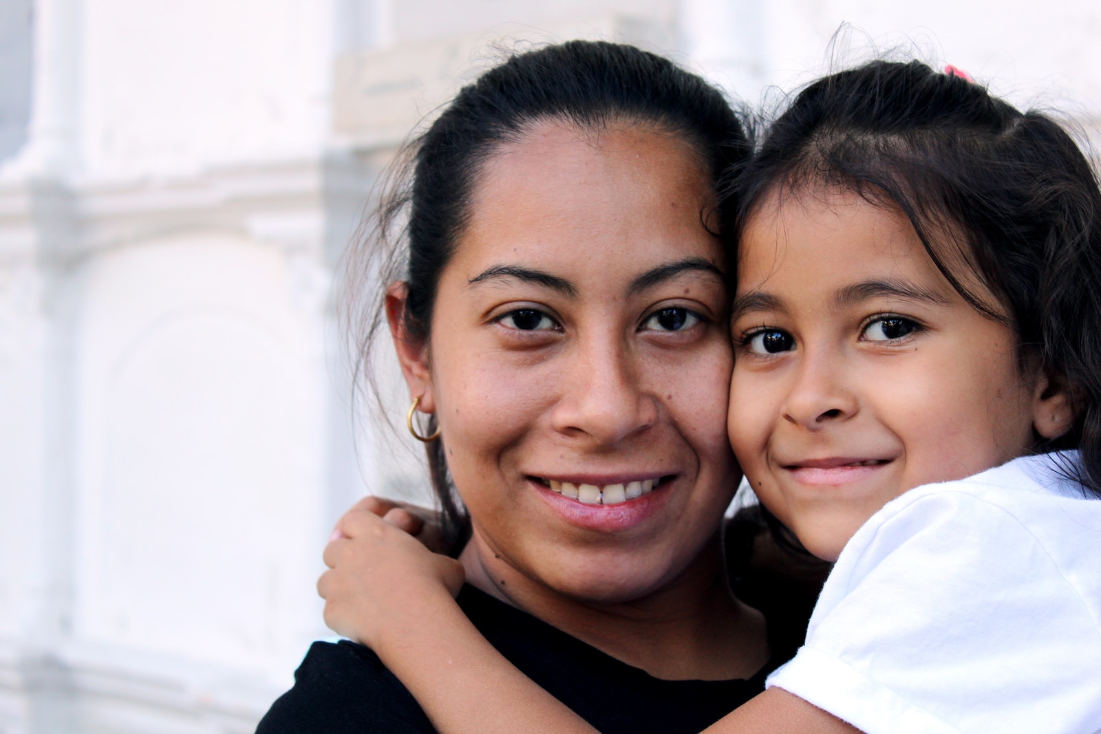 Hispanic mom and daughter