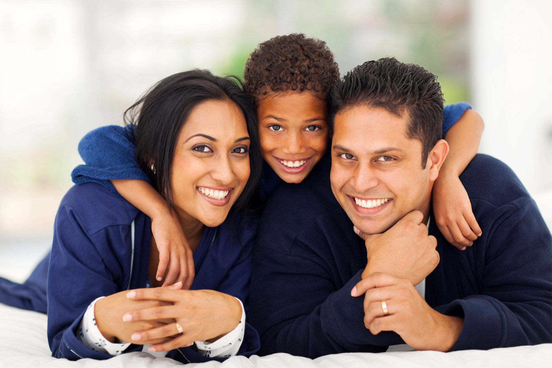Parents of color with young boy