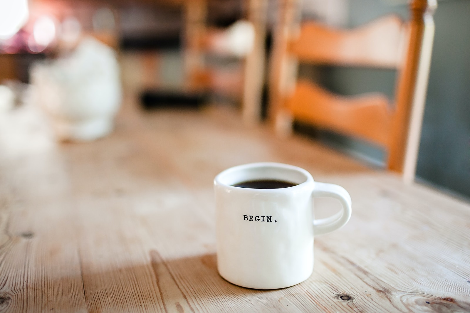 White coffee mug on table