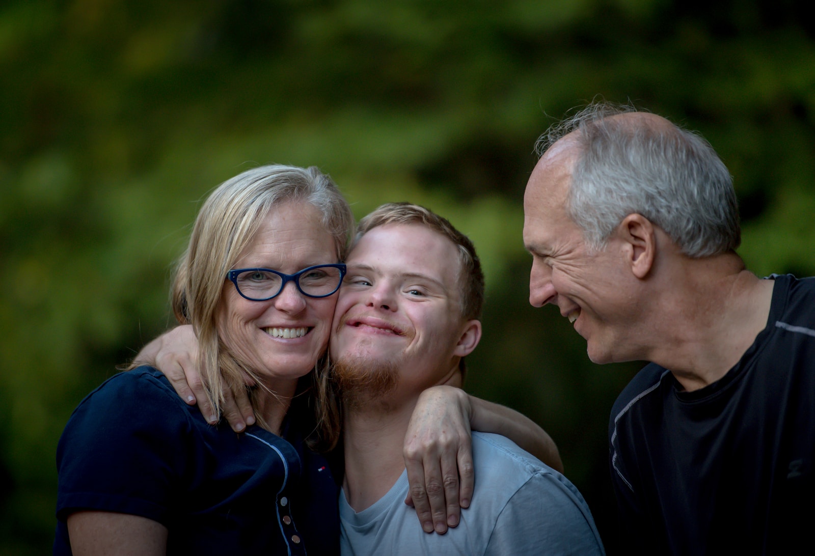 parents with Down syndrome young man