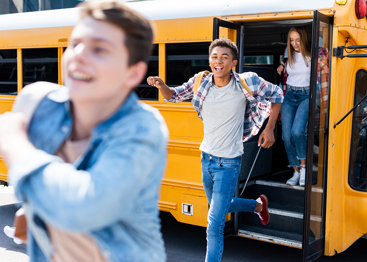 Group,Of,Teen,Students,Running,Out,Of,School,Bus